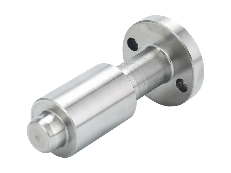 Photographed metal pin with a round mounting flange.