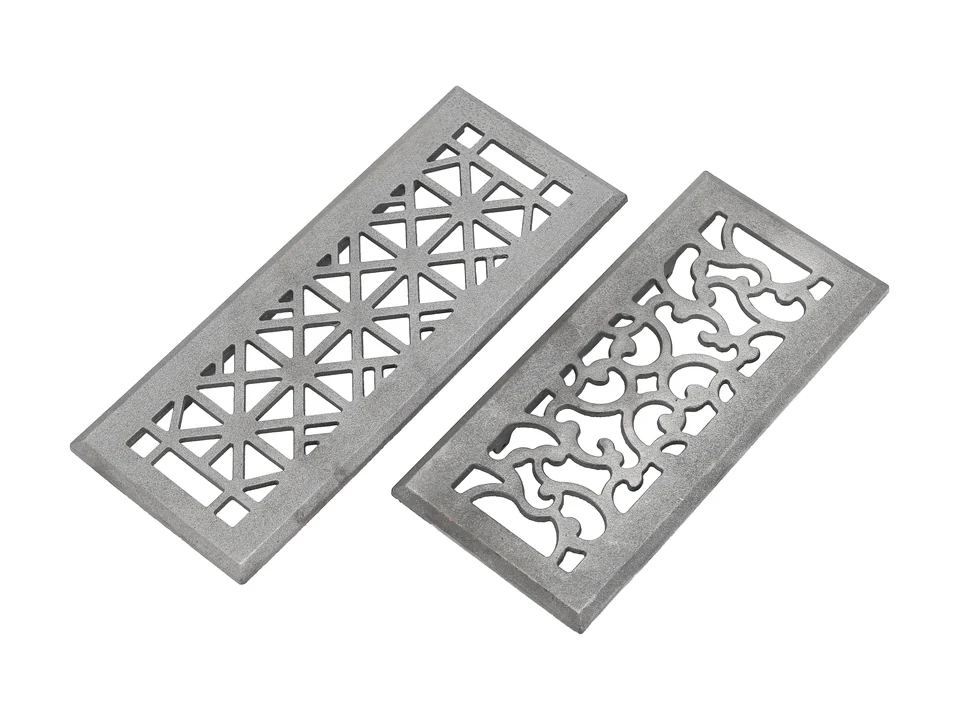 Two photographed metal drainage grates with different patterns.