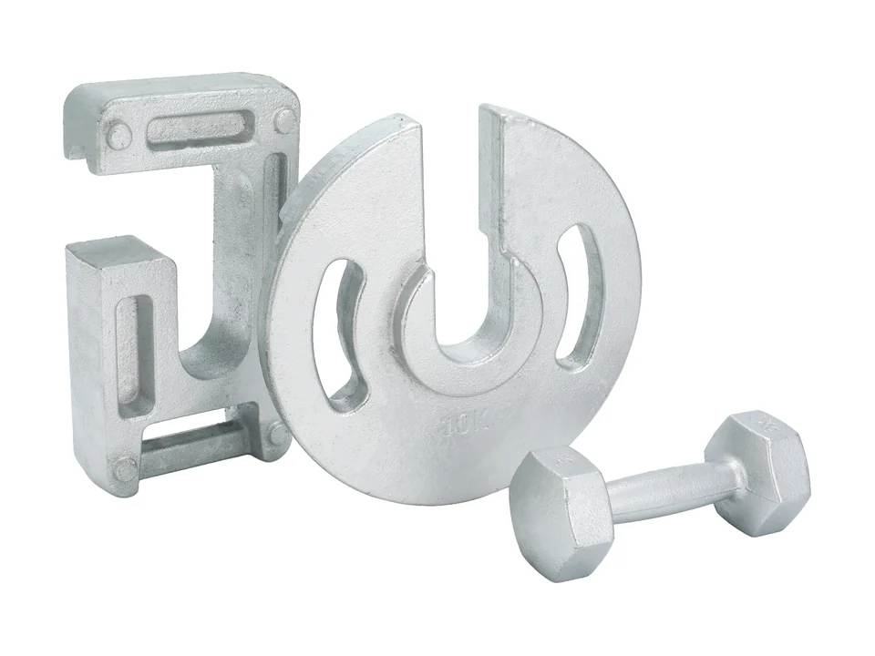 Photographed split weight components and fastening hardware.